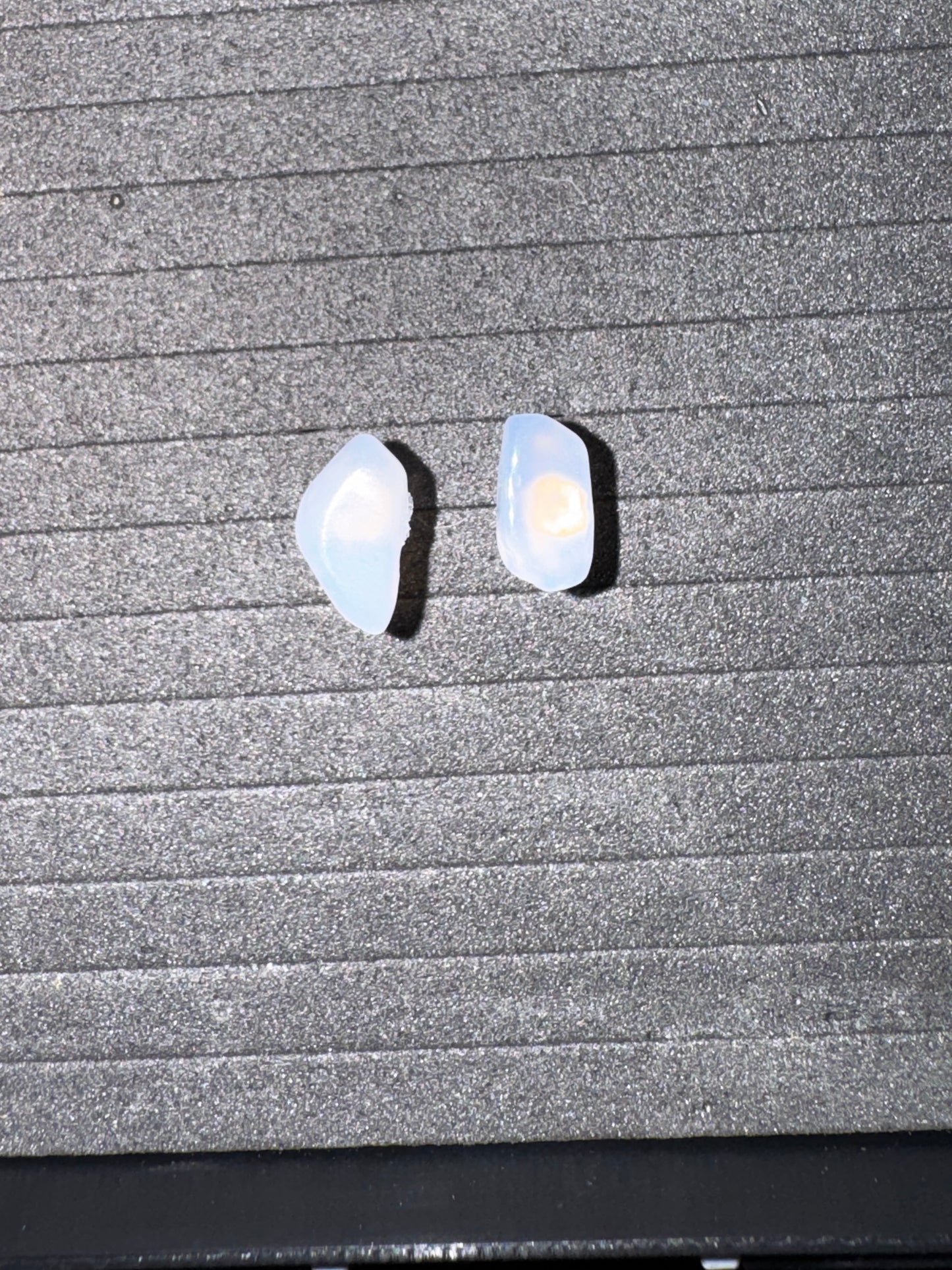 Blue Moonstone Earrings on a textured surface