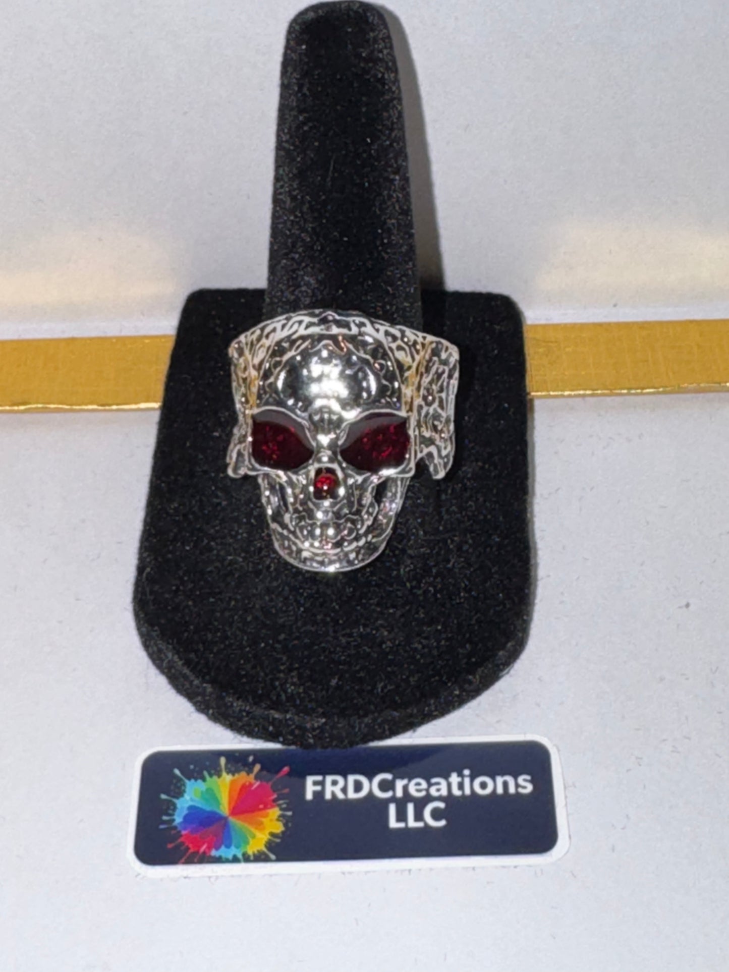 Curated Skeleton Ring With Red Eyes