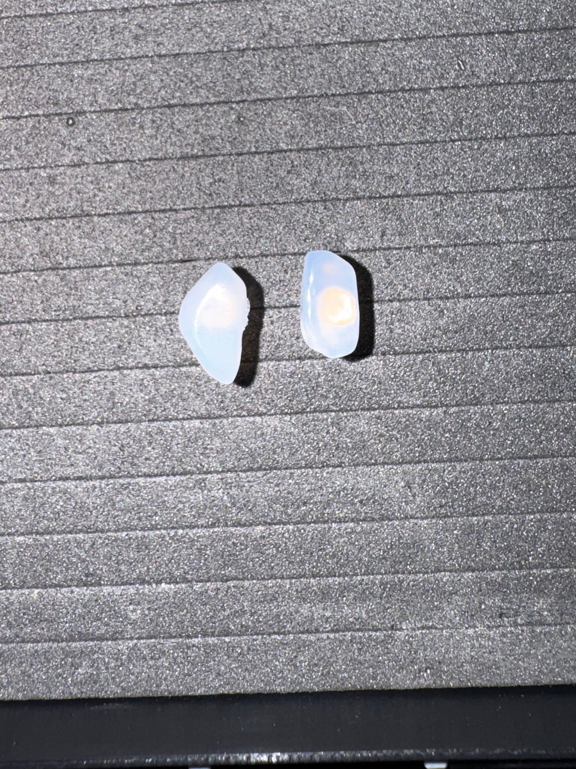 Blue Moonstone Earrings  on a textured surface