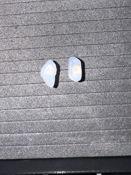 Blue Moonstone Earrings  on a textured surface