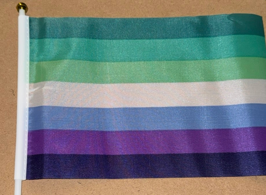 Flag with horizontal stripes of green, white, blue, and purple on a beige background