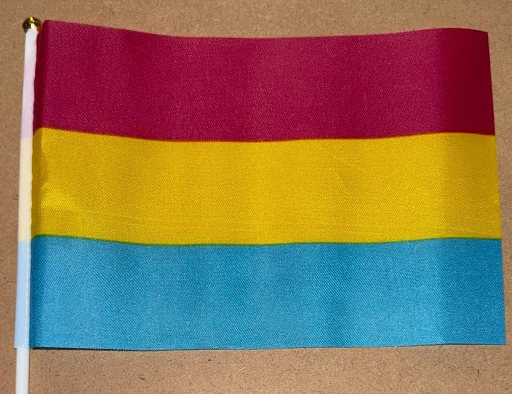 Pansexual flag with three horizontal stripes: red, yellow, and blue on a beige background.
