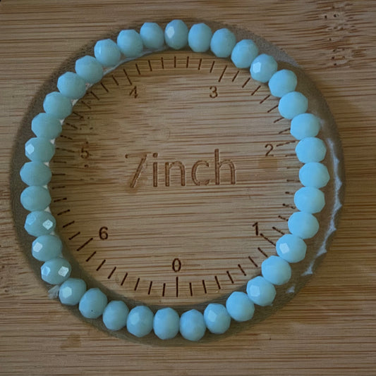 Aqua Beaded Bracelet on 7 inch bracelet sizer 