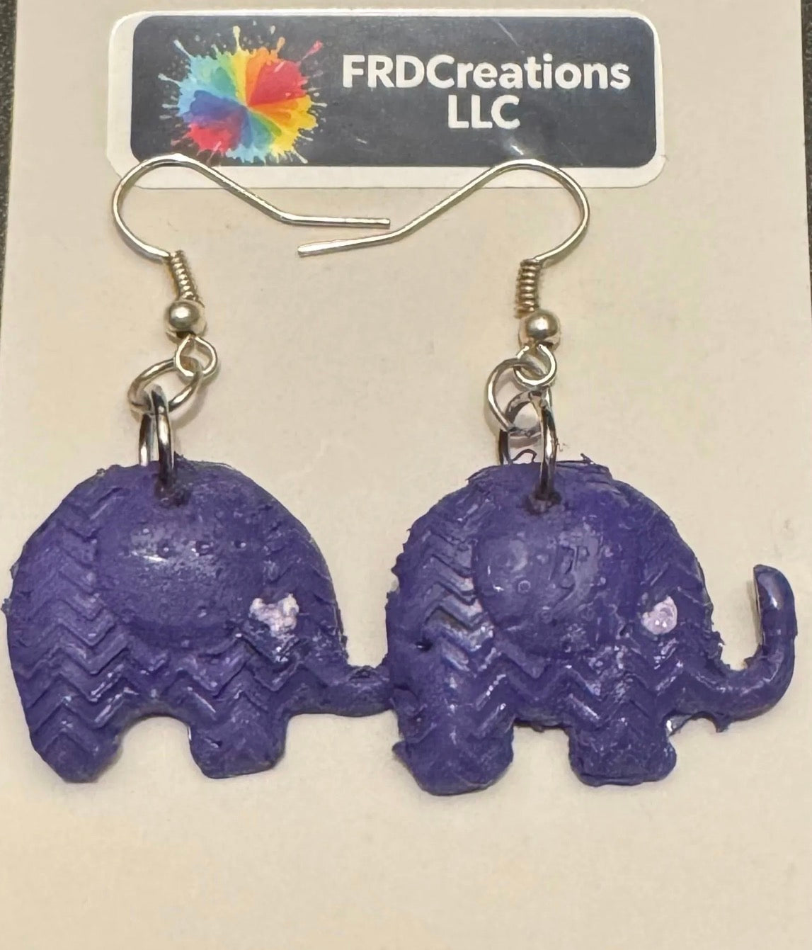 Purple elephant-shaped earrings 