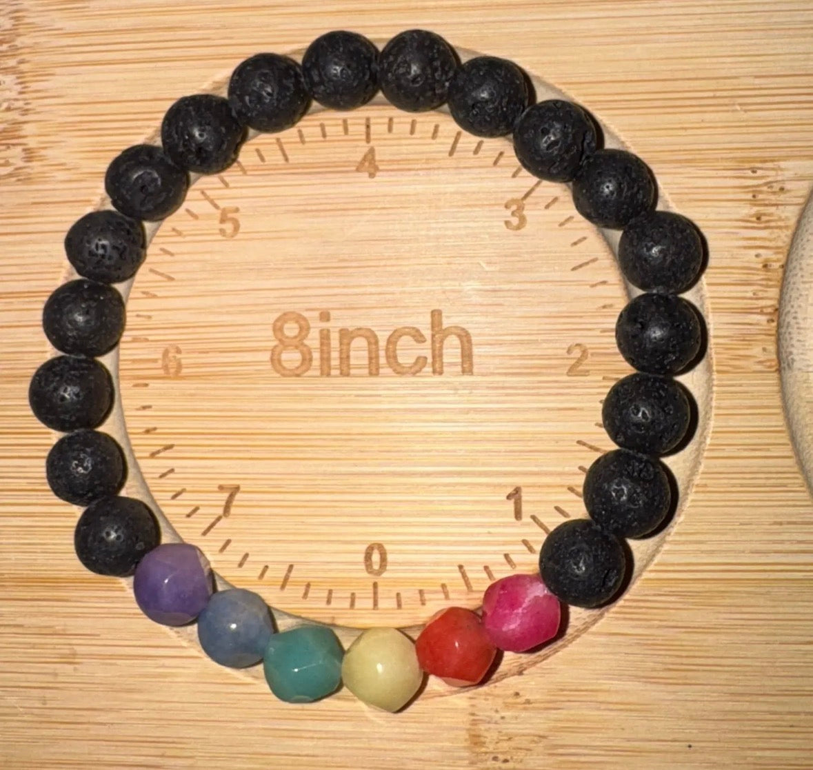 Black Lavastone with dyed rainbow quartz stone