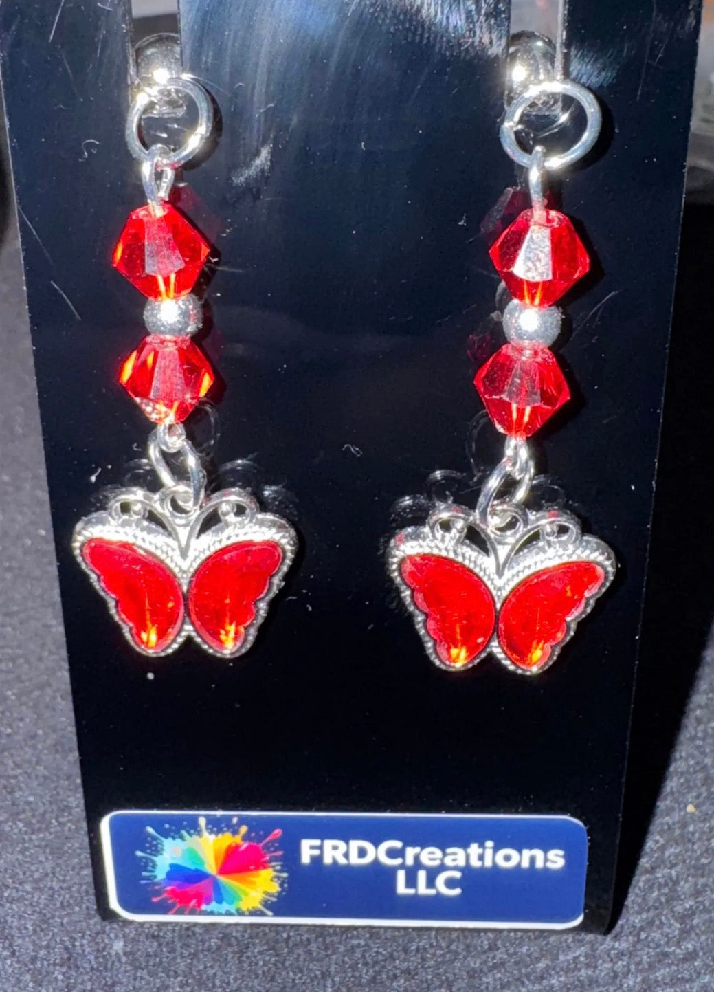 Red butterfly dangle earrings