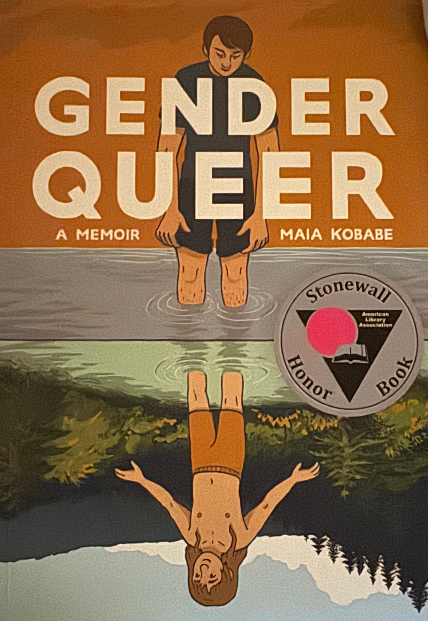 Book cover of 'Gender Queer' by Maia Kobabe with a reflection of a person in water and the Stonewall Honor Book badge.
