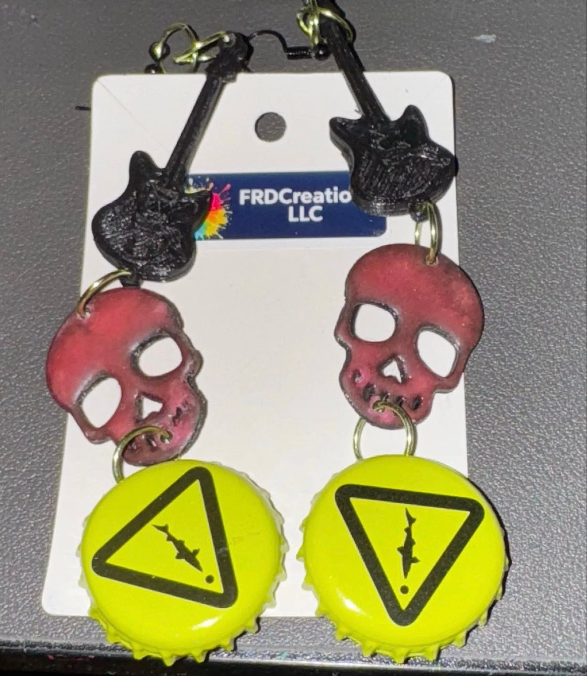 Black Guitar, Pink Skull and Yellow bottle cap earrings 