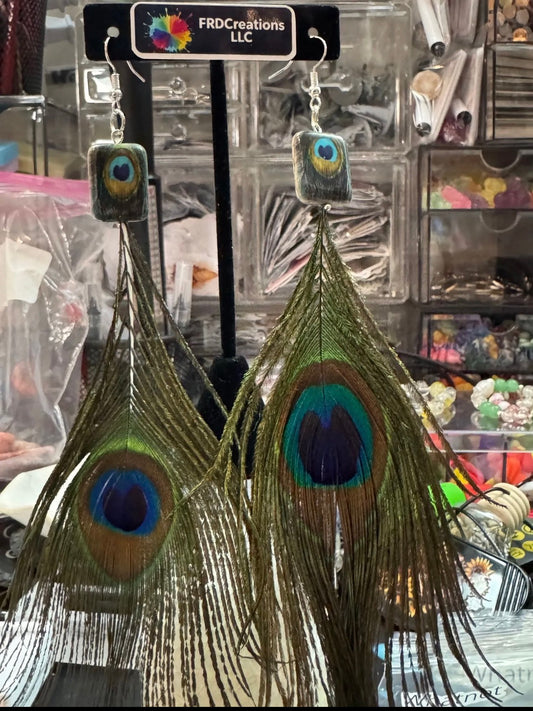 peacock feather earrings. 