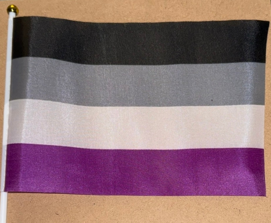 Flag with black, gray, white, and purple horizontal stripes on a beige background