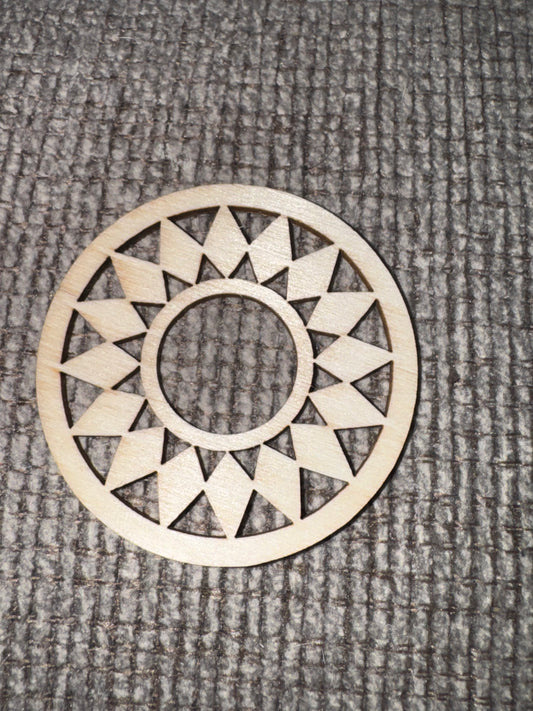 Wooden geometric decorative item on a textured surface